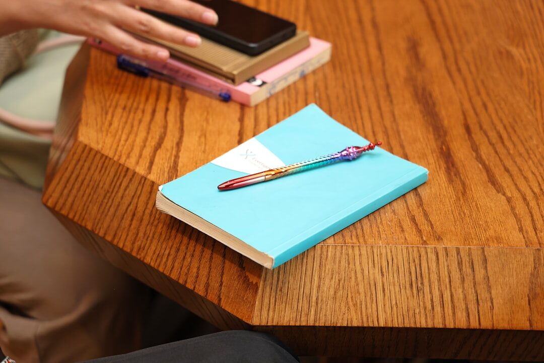 writer at desk with notebook
