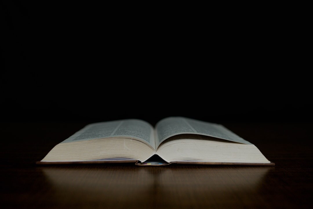 open book on table at night